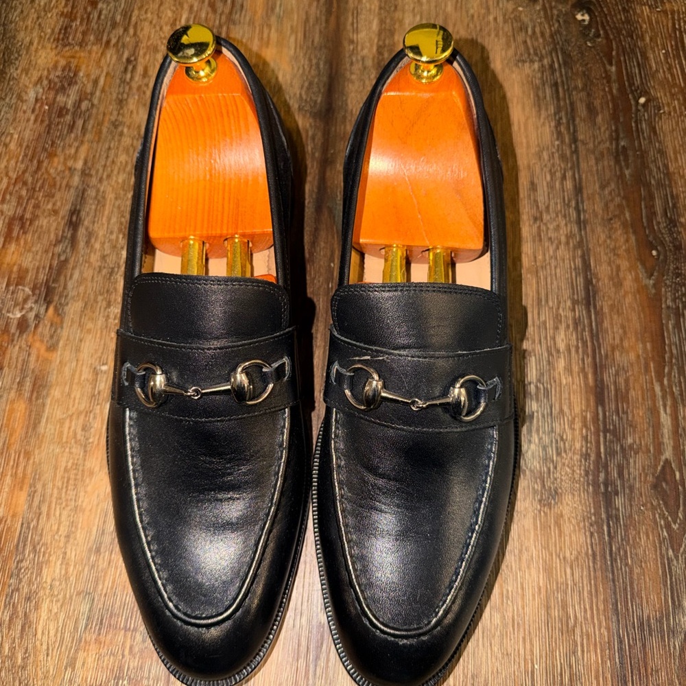 Sophisticated Black Leather Loafers with Metal Accent